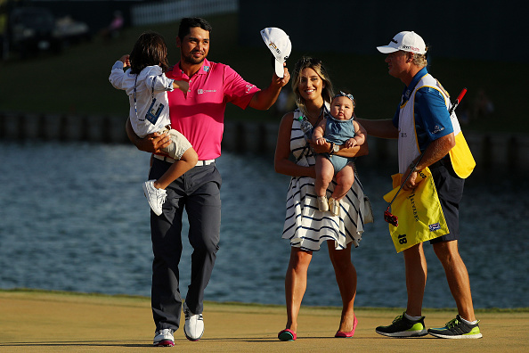 PONTE VEDRA BEACH, FL - MAY 15: Jason Day of Australia celebrates with son Dash, wife Ellie and daughter Lucy and caddie Colin Swatton after winning during the final round of THE PLAYERS Championship at the Stadium course at TPC Sawgrass on May 15, 2016 in Ponte Vedra Beach, Florida. (Photo by Mike Ehrmann/Getty Images)