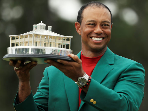 AUGUSTA, GEORGIA - APRIL 14: Tiger Woods of the United States celebrates with the Masters Trophy during the Green Jacket Ceremony after winning the Masters at Augusta National Golf Club on April 14, 2019 in Augusta, Georgia. (Photo by Mike Ehrmann/Getty Images)