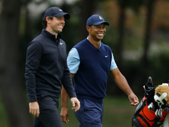 INZAI, JAPAN - OCTOBER 21: Tiger Woods of the United States and Rory McIlroy of Northern Ireland shares a laugh on the 4th hole during The Challenge: Japan Skins at Accordia Golf Narashino Country Club on October 21, 2019 in Inzai, Chiba, Japan. (Photo by Richard Heathcote/Getty Images)