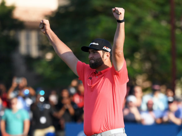 DUBAI, UNITED ARAB EMIRATES - NOVEMBER 24: Jon Rahm of Spain celebrates after putting in for a birdie on the eighteenth green to win the DP World Tour and Race to Dubai during Day Four of the DP World Tour Championship Dubai at Jumerirah Golf Estates on November 24, 2019 in Dubai, United Arab Emirates. (Photo by Ross Kinnaird/Getty Images)
