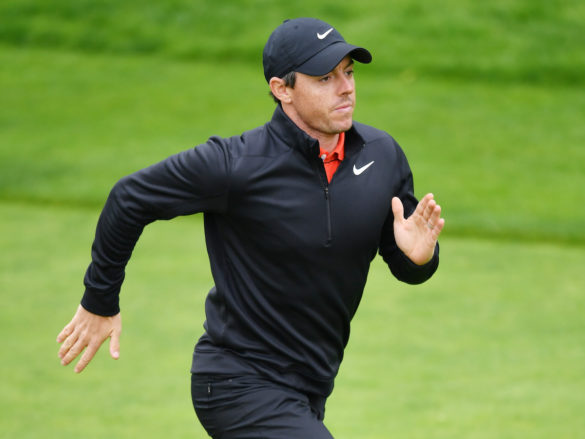 BETHPAGE, NEW YORK - MAY 14: Rory McIlroy of Northern Ireland jogs up a fairway during a practice round prior to the 2019 PGA Championship at the Bethpage Black course on May 14, 2019 in Bethpage, New York. (Photo by Stuart Franklin/Getty Images)